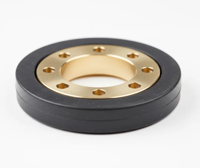 Black molded rubber component with a brass insert